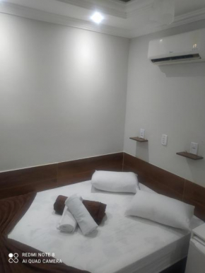 Quarto Casal com ar,frigobar, garagem